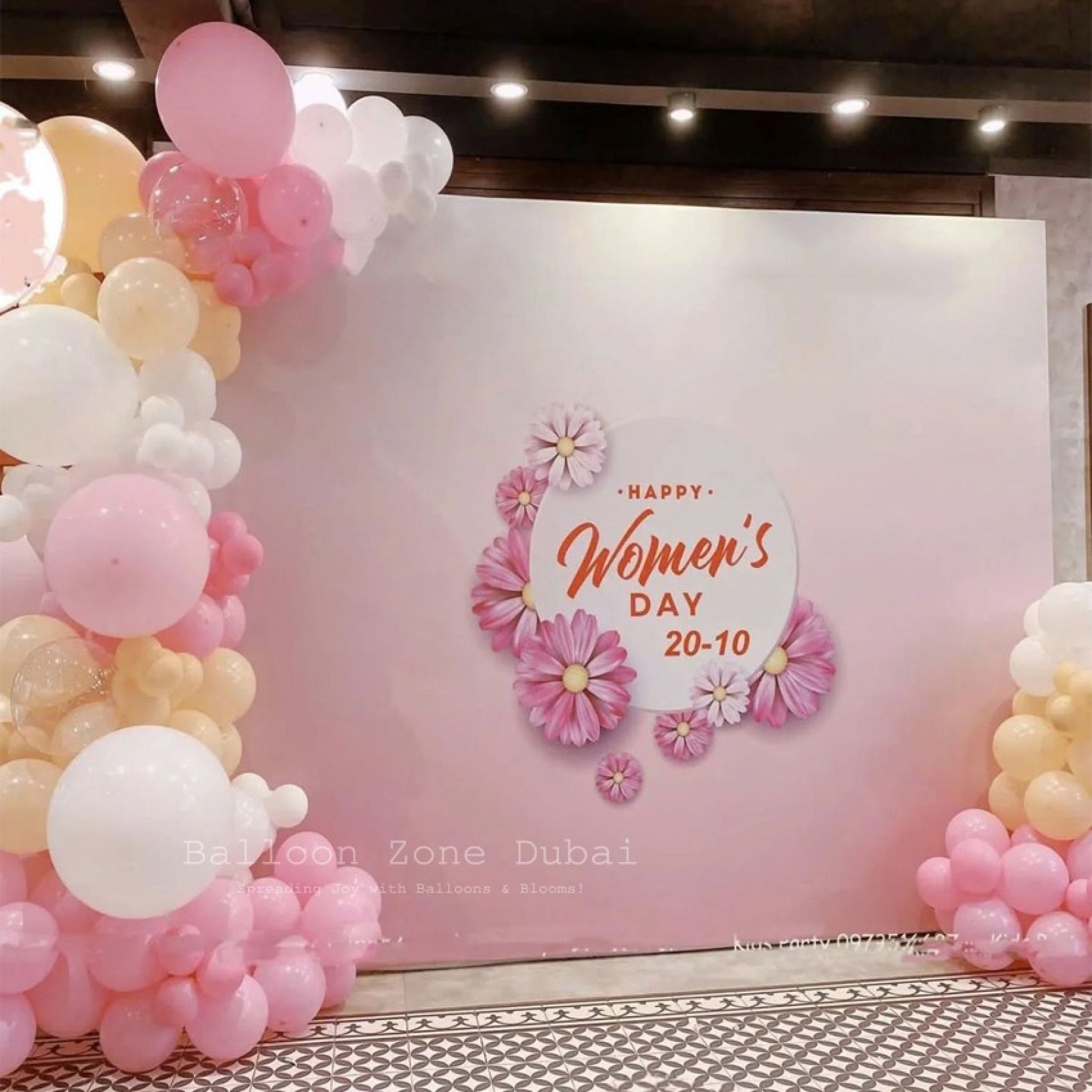Luxurious Womenâ€™s Day Floral Photo Backdrop & Organic Balloon Garland Setup